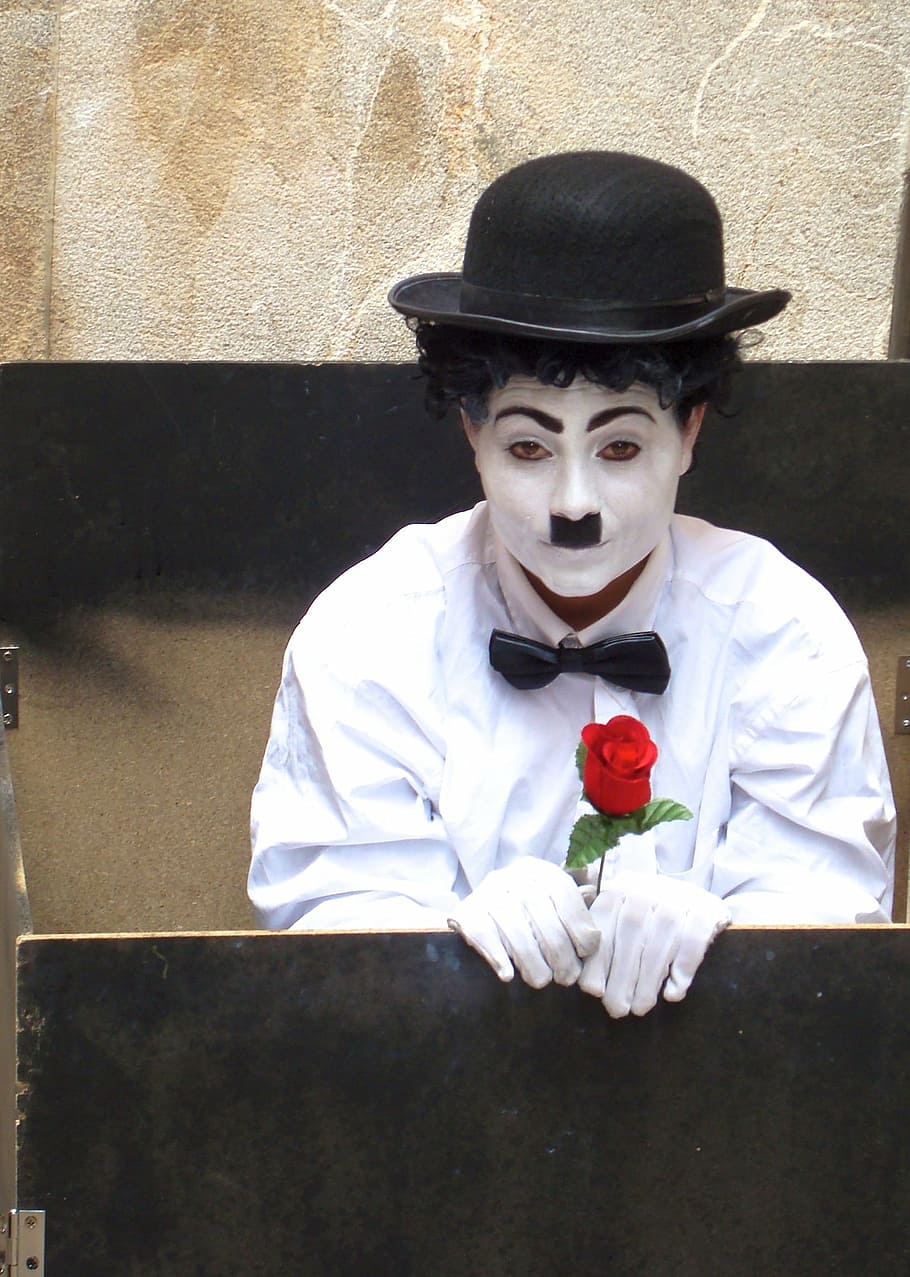 HD wallpaper: man in white dress shirt and Charlie Chaplin makeup, rose,  clothing | Wallpaper Flare