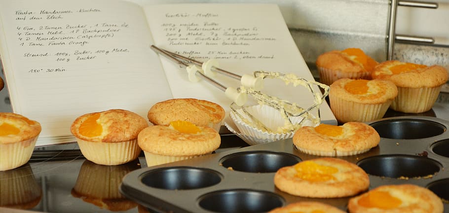 cupcakes near cook book, muffins, bake, small cakes, muffin form HD wallpaper