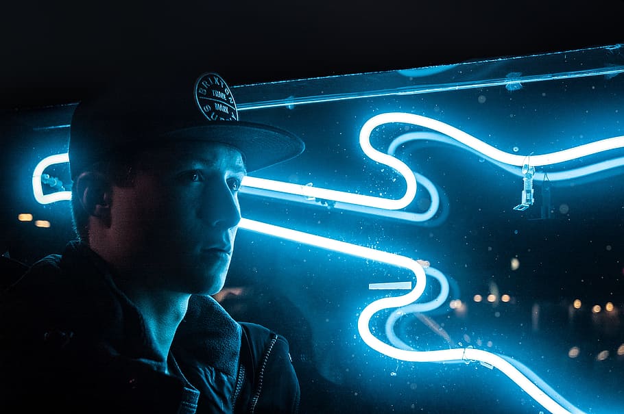Man In Black Jacket Beside Blue Neon Light Guitar, cap, dark HD wallpaper