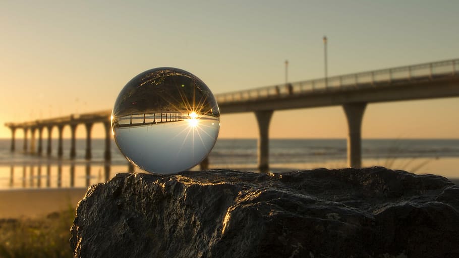 ball near bridge at sunset, new brighton, crystal ball, sunrise