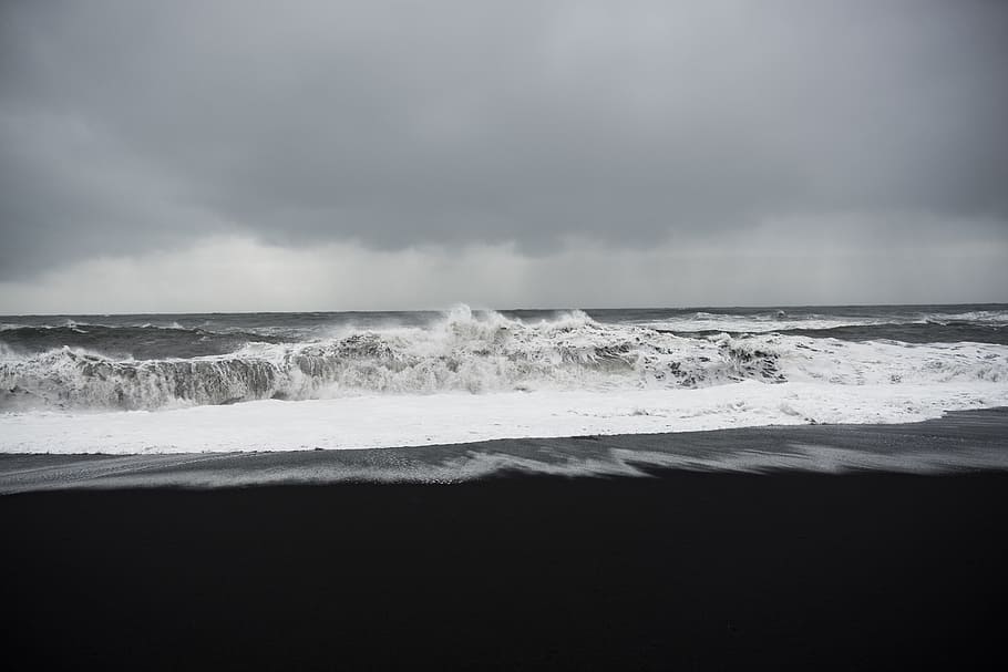grayscale photo of shore under clouds, ocean waves, Iceland, sea
