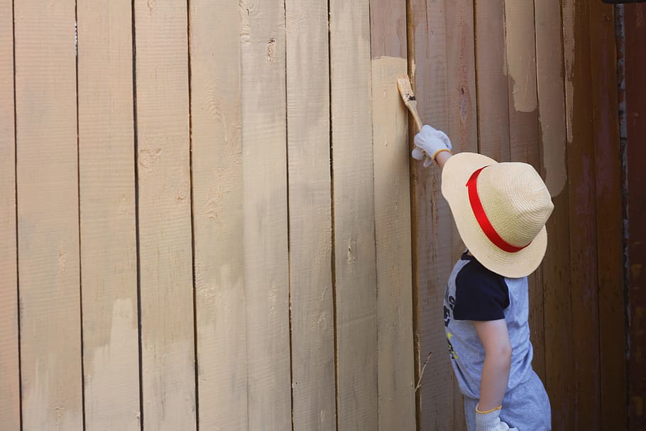 toddler painting brown wall, child, wooden, boy, fence, one person HD wallpaper