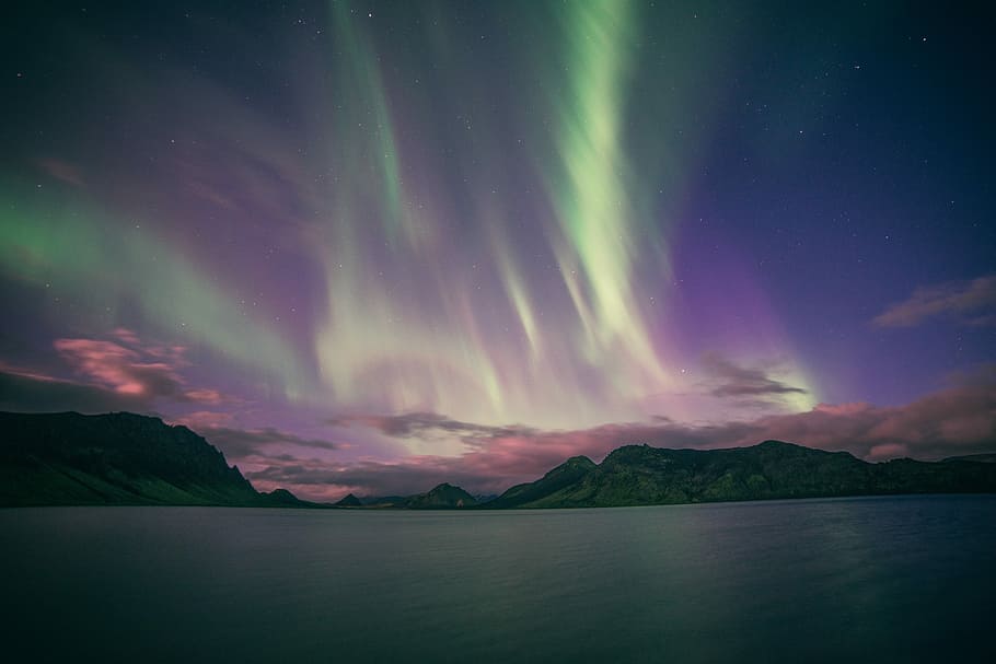 landscape photography of mountains, northern lights above mountain view