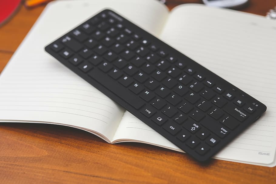 black wireless computer keyboard, technology, desktop, note HD wallpaper
