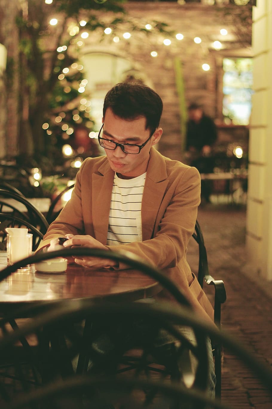 portrait, emotion, bokeh, night, man, male, cafe, outdoors HD wallpaper