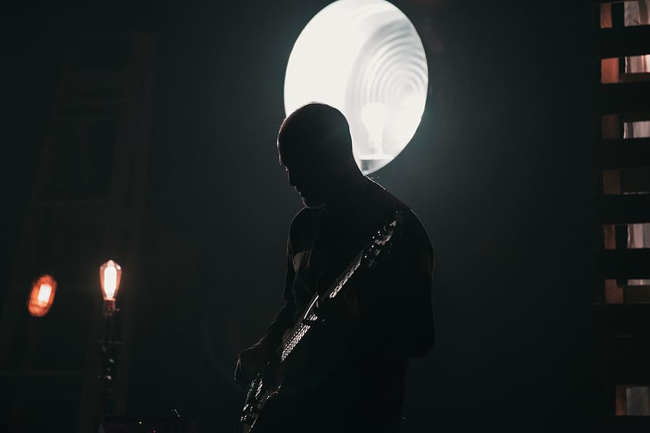 man holding electric guitar, people, band, concert, performance HD wallpaper