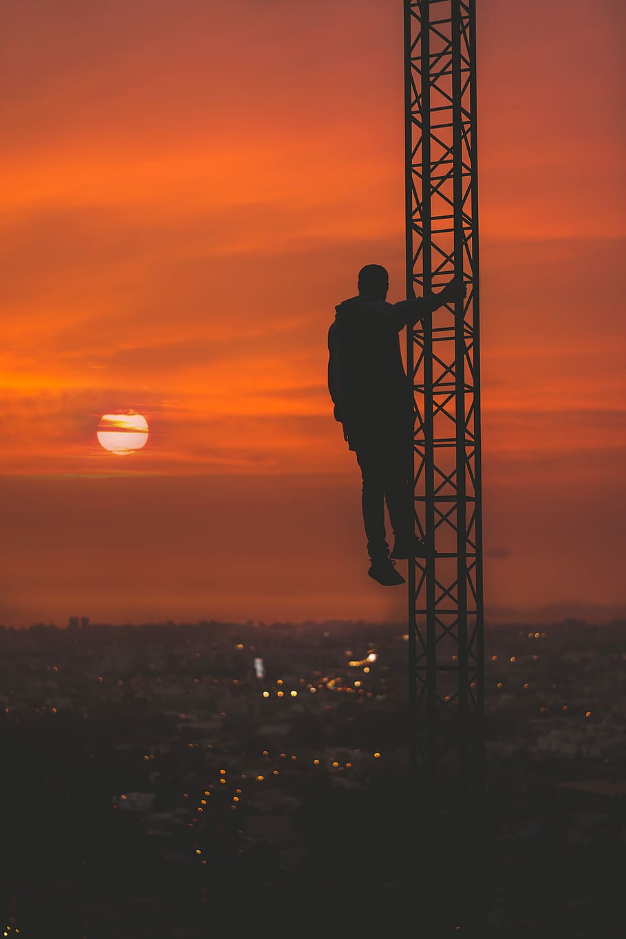 silhouette of man climbing tower during sunset, untitled, sunrise HD wallpaper