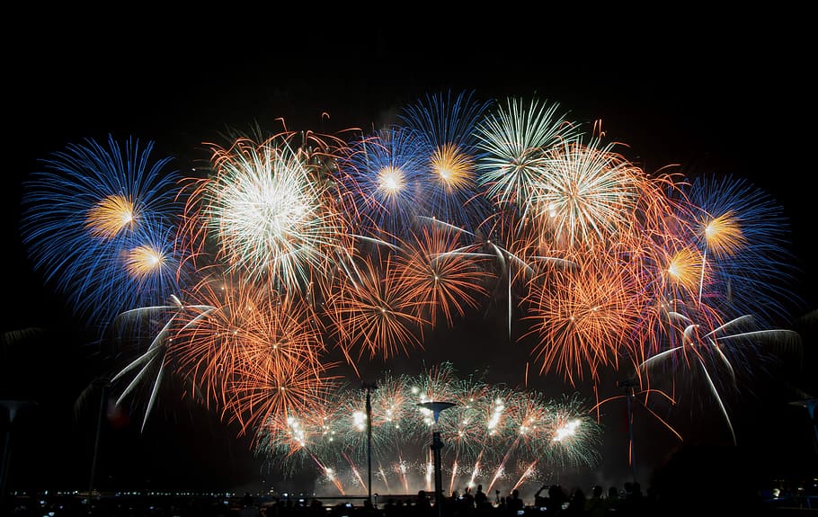 fireworks during night, people standing while looking at the fire works display HD wallpaper