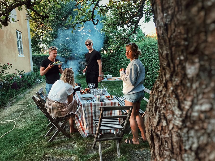 four person near table eating and standing, grill, picnic, weating HD wallpaper