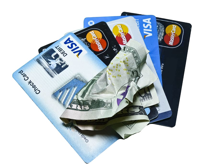 fan of assorted ATM cards, credit card, money, cash, plastic