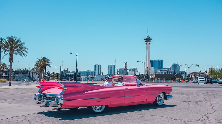 two people riding on pink convertible coupe, architecture, building HD wallpaper