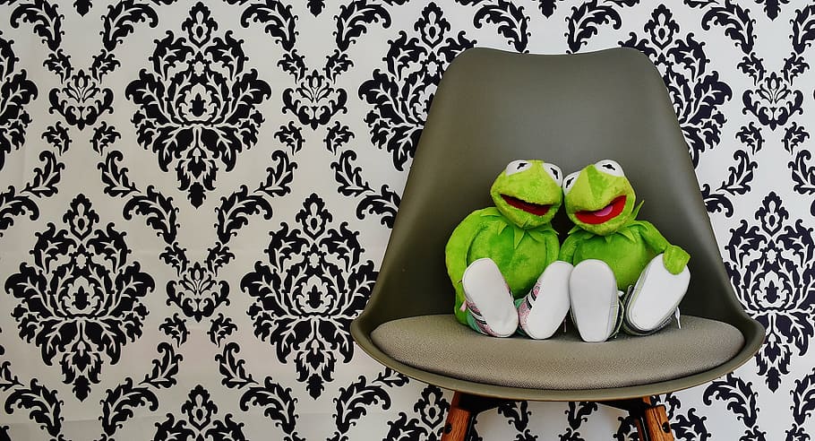 two Kermit the frog plush toys on black sofa chair, for two HD wallpaper
