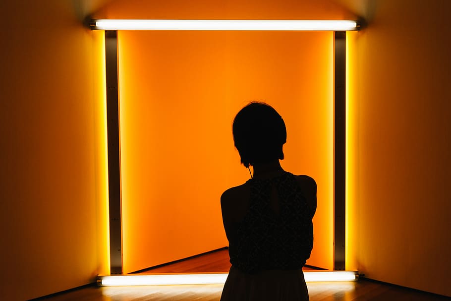 woman standing in front of yellow lamp, caustic, reflection HD wallpaper