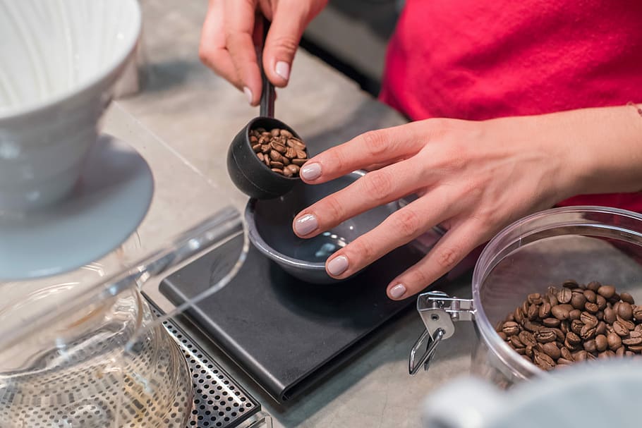 person pouring coffee beans on bowl, hand, measurement, human hand HD wallpaper