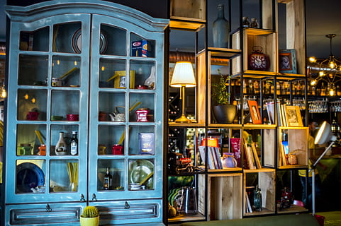 assorted decors in teal wooden display cabinet, interior, decoration HD wallpaper