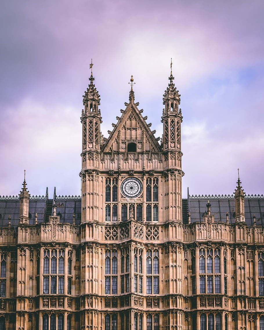 brown concrete cathedral, gray concrete cathedral under cloudy sky during daytime HD wallpaper
