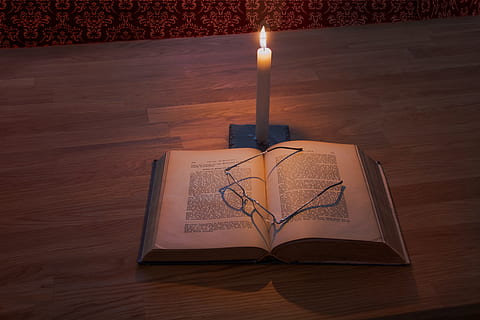 white taper candle and book on brown wooden table, education HD wallpaper