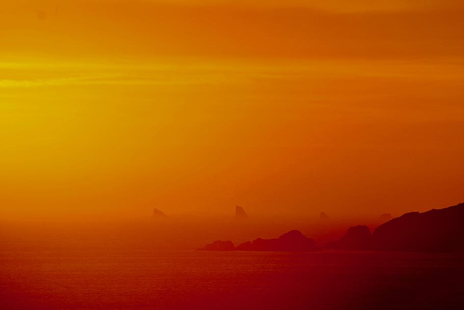 seashore golden hour, silhouette of mountains near shoreline at golden hour HD wallpaper