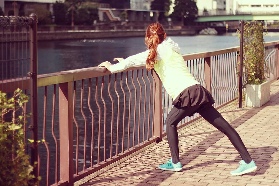 photo of women stretching beside body of water, outdoors, people HD wallpaper