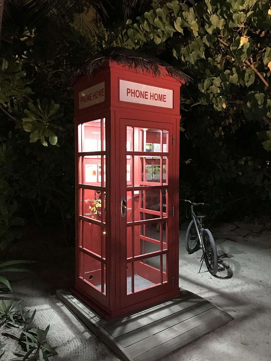 red telephone booth beside black bicycle at nighttime, vintage, HD wallpaper