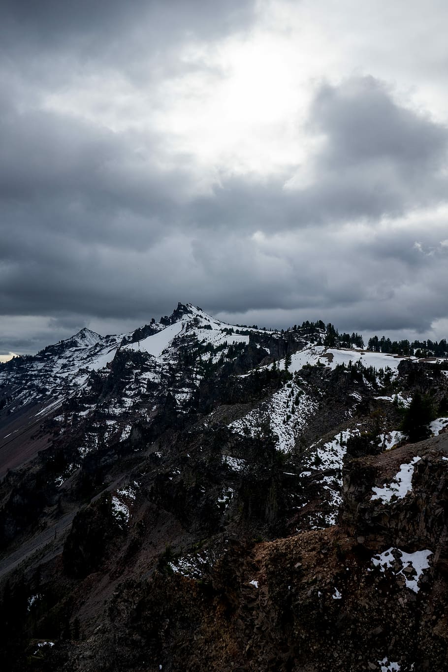 snow-covered mountain under cloudy sky, aerial view of mountain HD wallpaper