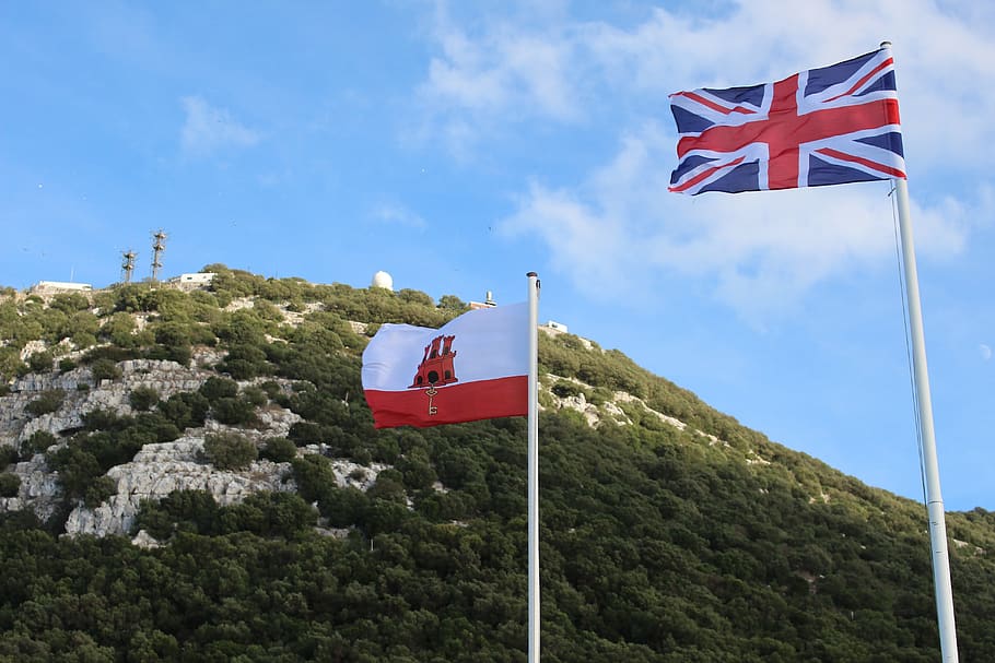 flags, england, gibraltar, rock, patriotism, sky, red, nature HD wallpaper