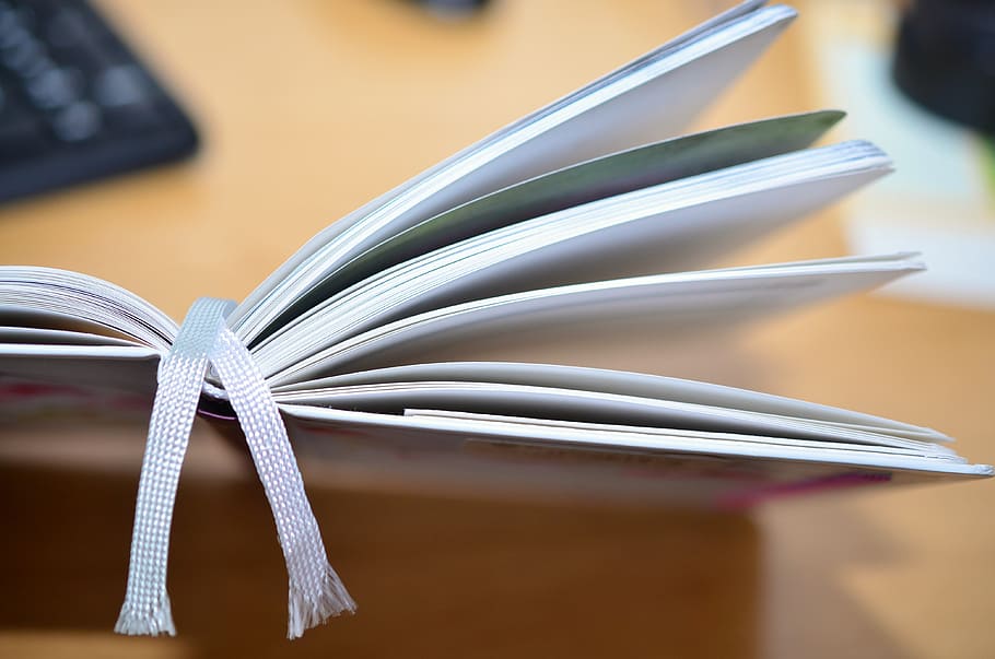 selective focus photograph of book on wood surface, desk, notes HD wallpaper