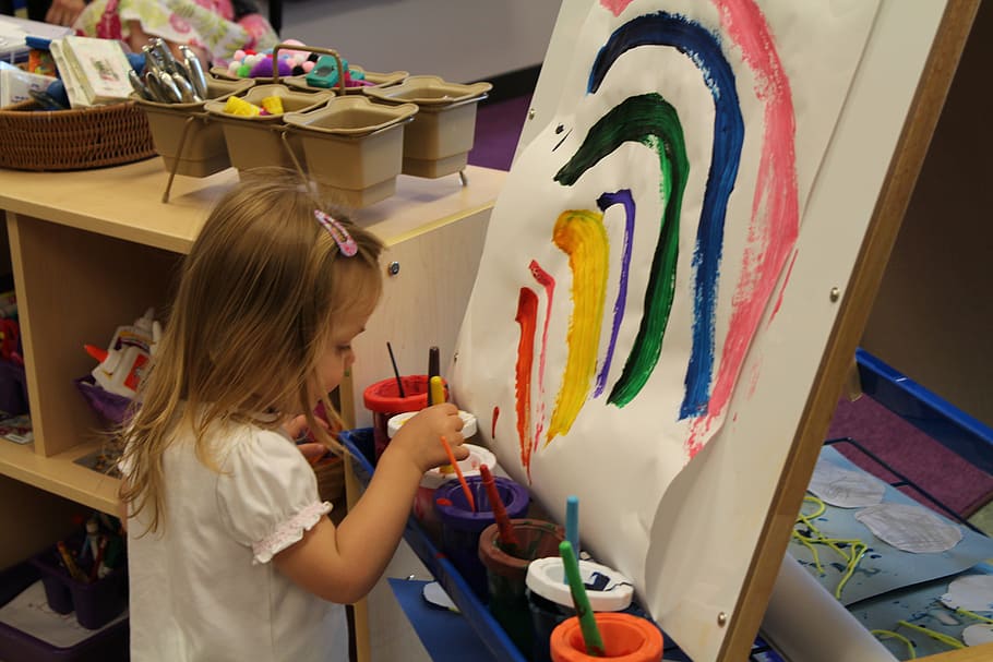girl holding yellow paint brush, rainbow, art, artistic, child
