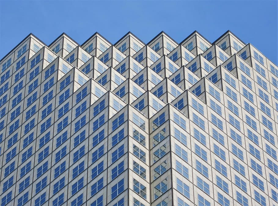 HD wallpaper: white and blue geometric high-rise building at daytime