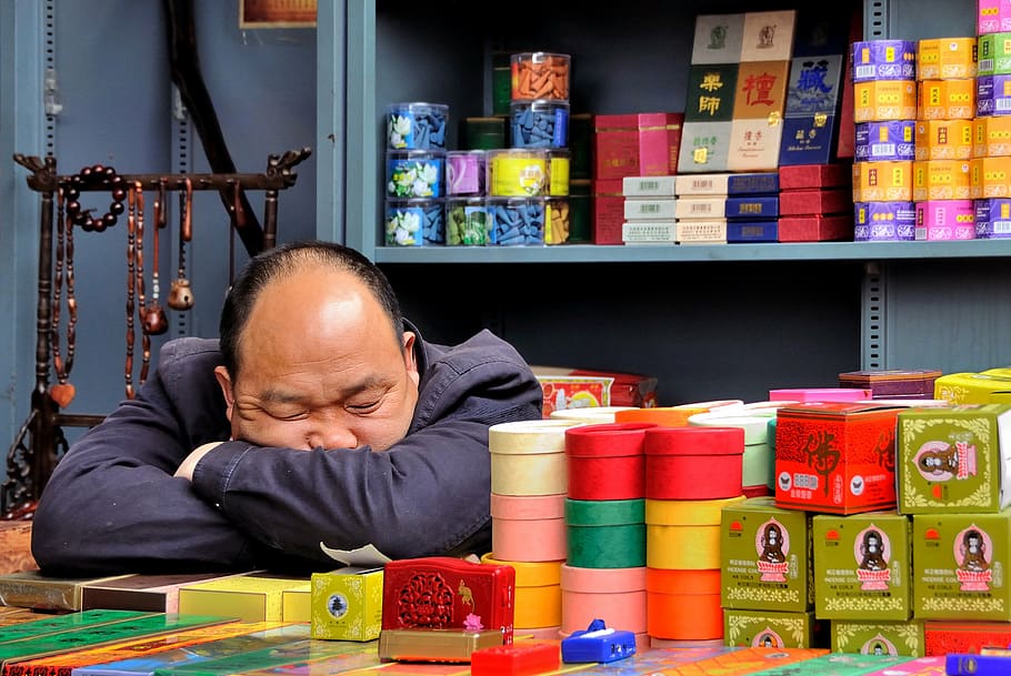 man leaning on table, market, asleep, etal, incense, pekin, beijing, HD wallpaper