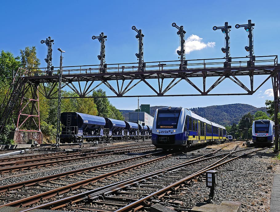 blue trains on railway at daytime, gleise, gantry, bad harzburg