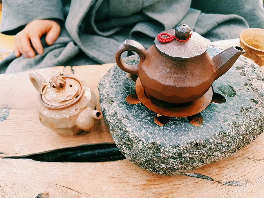 brown clay teapot on heated stone, brown kettle on stone fragment HD wallpaper