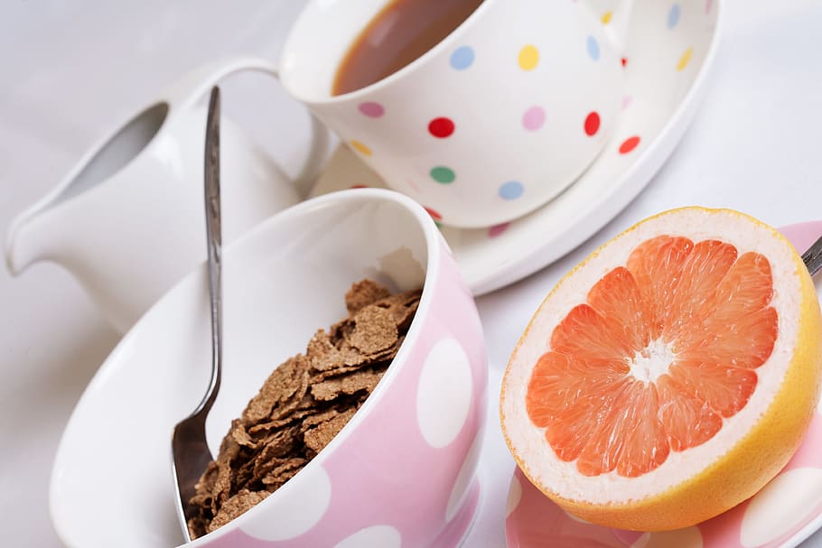 choco flakes cereal beside stainless steel spoon on white ceramic bowl HD wallpaper