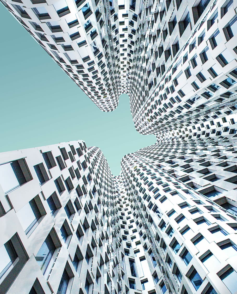 low angle view of high-rise buildings, low-angle photo of gray building taken during daytime HD wallpaper