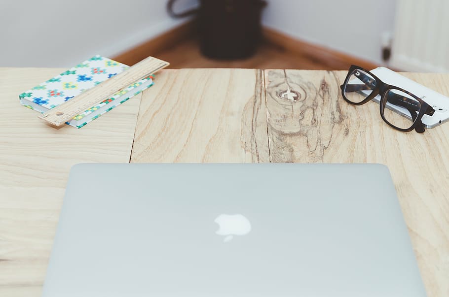 eyeglasses with black frames, silver, macbook, top, beige, wooden HD wallpaper