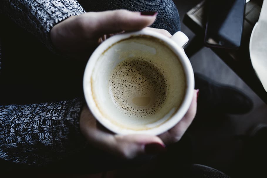 person holding white ceramic mug, person holding mug using both hands HD wallpaper