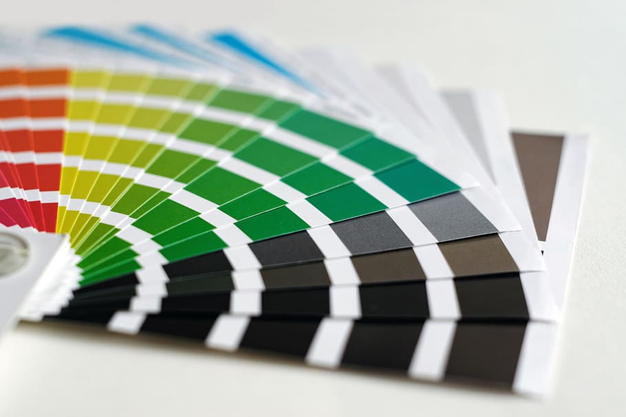 paint color fan deck on white surface, print, colors, stencil