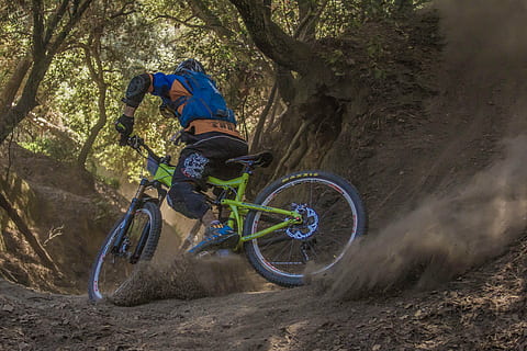man riding green full-suspension bicycle, nature, woods, forest HD wallpaper