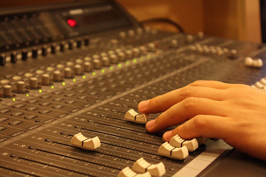 person holding white audio mixer button, hand, volume, audios HD wallpaper