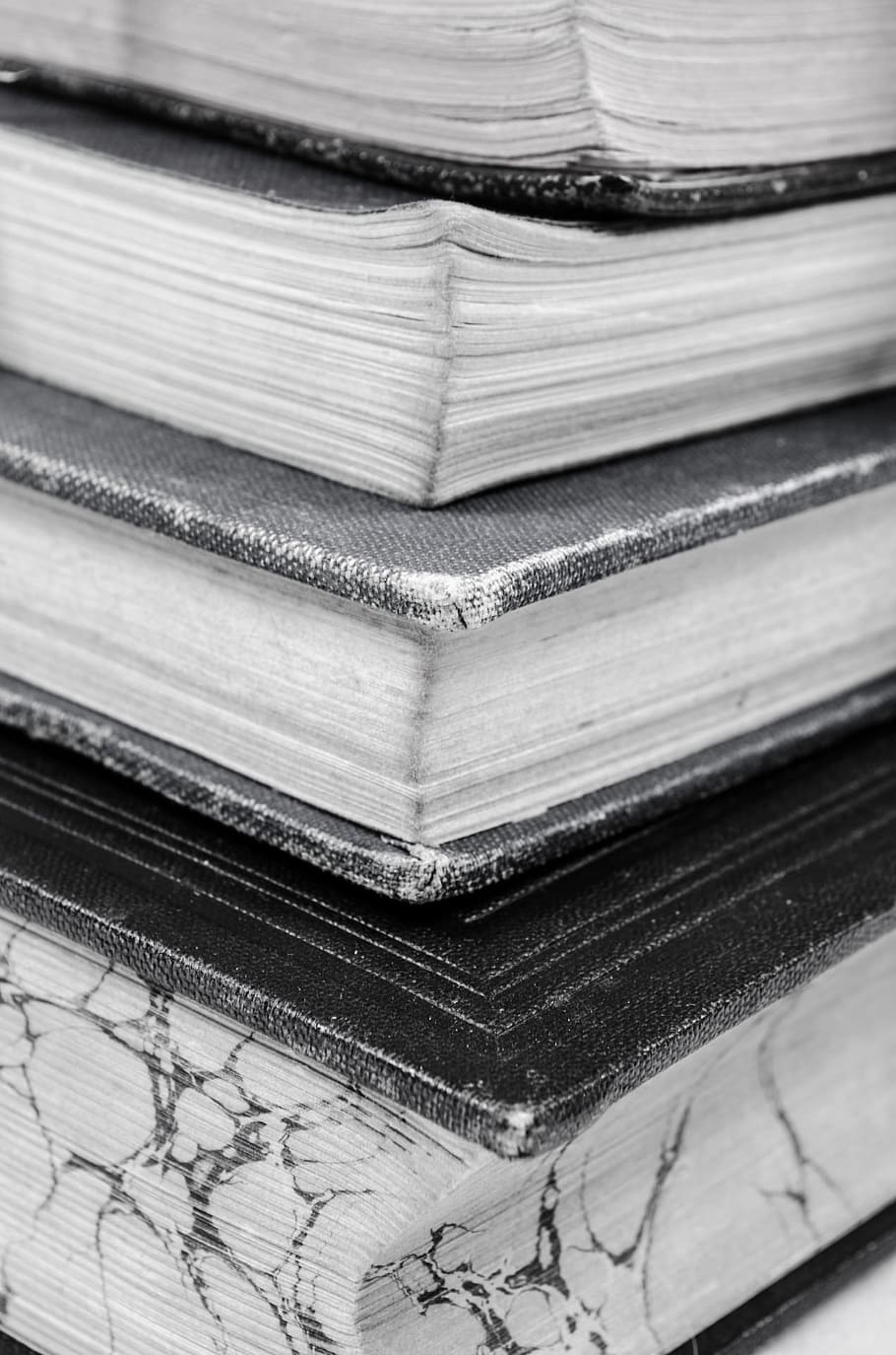 four close-up photo of hardbound books, old, pile, stack, bookshelf HD wallpaper