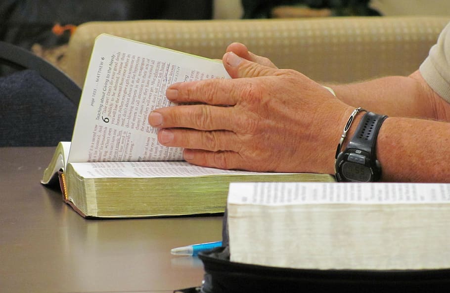 person reading book, books, bible study, open book, hands, man HD wallpaper