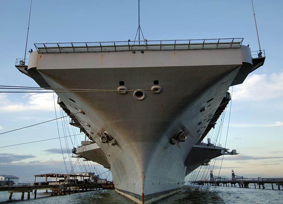 bottom view shot of gray aircraft carrier, uss harry s truman