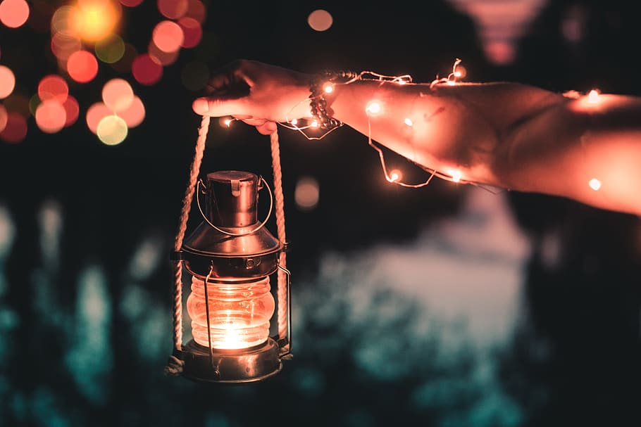 person holding black kerosene lantern, night, celebration, christmas HD wallpaper