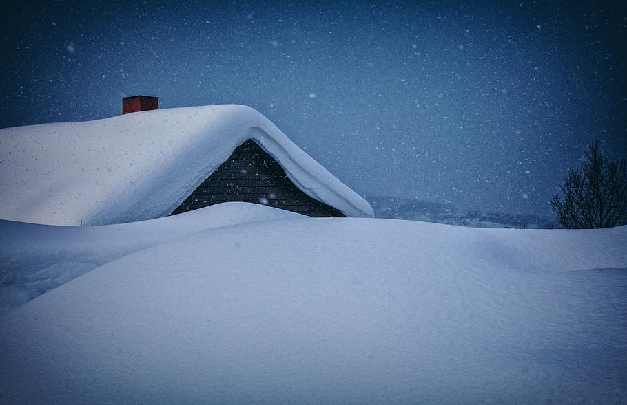 snow coated house at nighttime, house filled with snow, snowing HD wallpaper