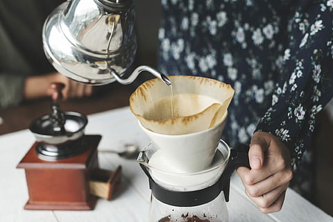 person holding teapot while pouring liquid in cup, coffee, drink HD wallpaper