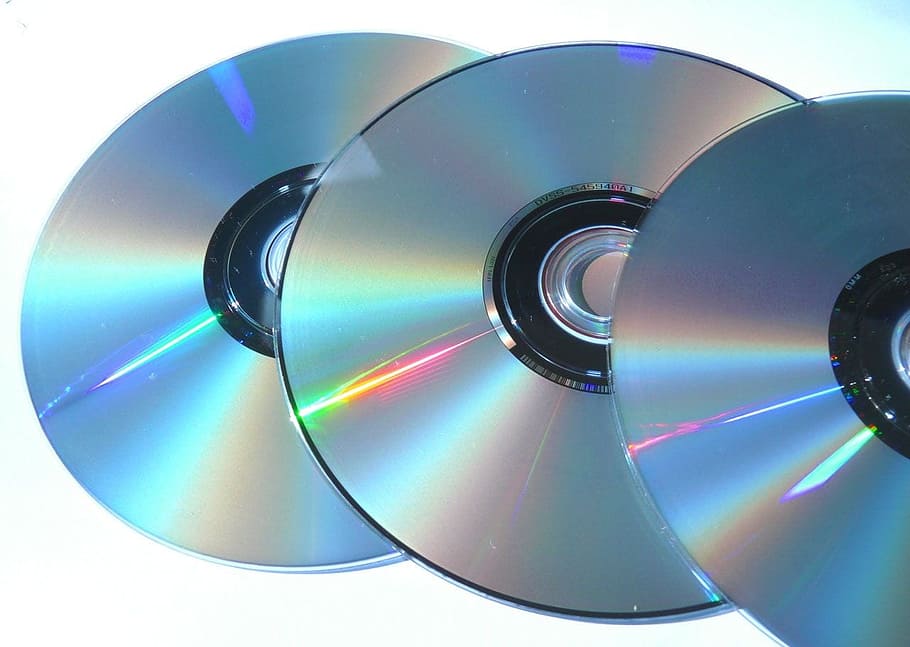 three compact discs on white surface, dvd, cd, disk, digital, HD wallpaper