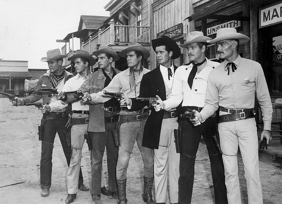 graysale photo of men holding rifles, will hutchins, sugarfoot