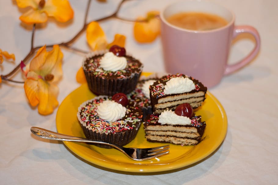 cupcake served on yellow plate with fork, Tart, Pastries, Small