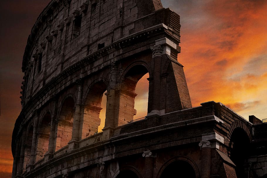 photo of Colosseum during golden hour, Colosseum Rome, Italy during sunset