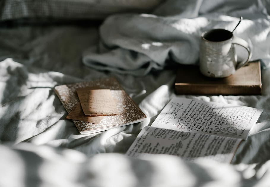 white mug beside white paper, white mug near opened book, cup HD wallpaper
